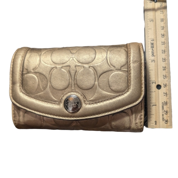 Metallic Gold Coach Embossed Trifold Wallet - Picture 15 of 16
